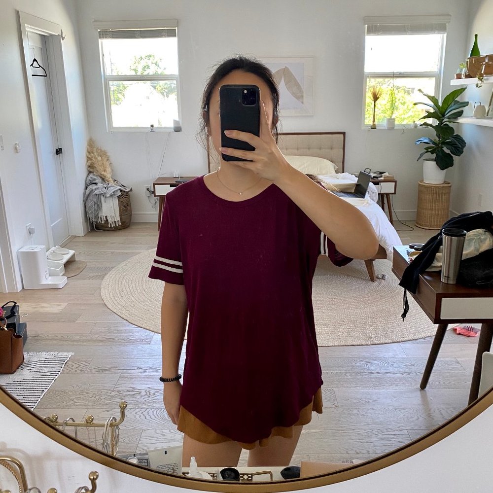 Maroon shirt with white stripe